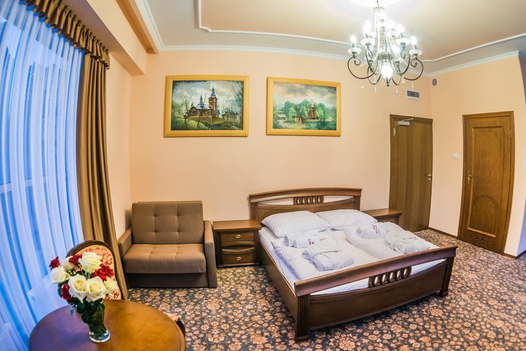 Victoria Cechini Hotell Krynica Zdroj Rom bilde